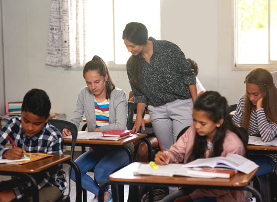Checking on her class progress.